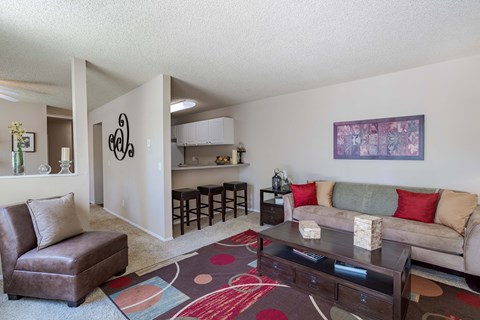 a living room with a couch and a coffee table